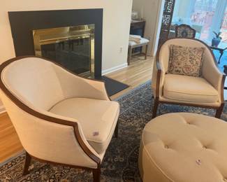 PAIR OF BEIGE CHAIRS AND ROUND COFFEE TABLE