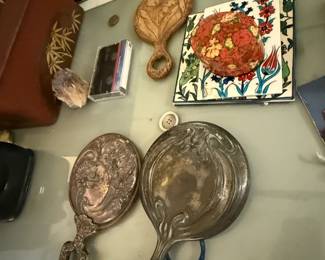 Silver mirrors, tile, perfume