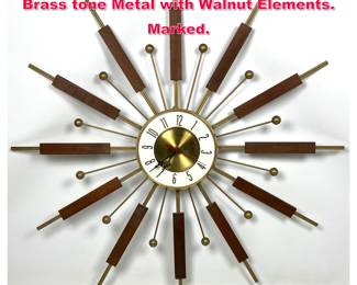 Lot 619 MCM ELGIN Starburst Wall Clock. Brass tone Metal with Walnut Elements. Marked.
