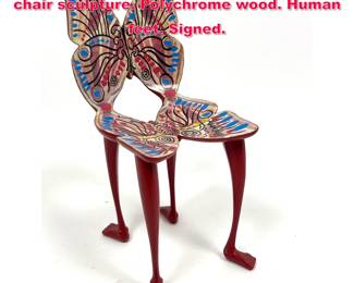 Lot 11 Pedro Friedeberg miniature Butterfly chair sculpture. Polychrome wood. Human feet. Signed.