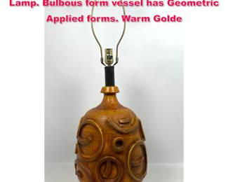 Lot 118 Modernist Sculptural Pottery Table Lamp. Bulbous form vessel has Geometric Applied forms. Warm Golde