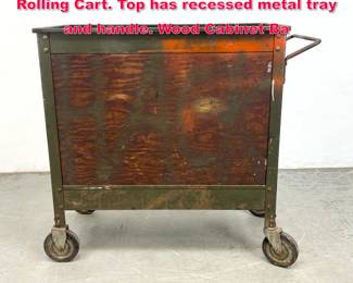 Lot 609 LYON Industrial Wood and Steel Rolling Cart. Top has recessed metal tray and handle. Wood Cabinet Ba