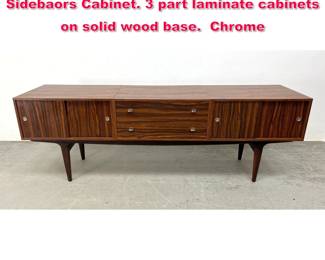 Lot 419 Mid Century Modern Credenza Sidebaors Cabinet. 3 part laminate cabinets on solid wood base. Chrome