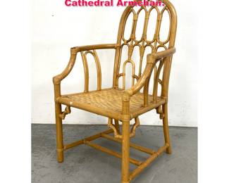 Lot 597 McGuire Style Rattan and Bamboo Cathedral Armchair.