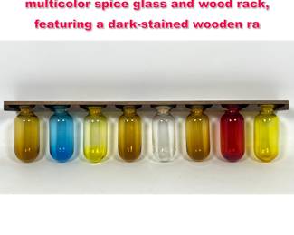 Lot 130 Mid Century Modern Japanese multicolor spice glass and wood rack, featuring a darkstained wooden ra