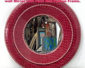 Lot 299 Contemporary Decorative Round wall Mirror with Faux Red Python Frame.