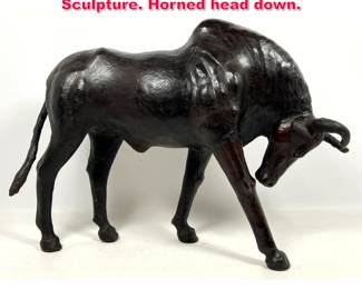 Lot 277 Leather Covered Bull Figural Sculpture. Horned head down.
