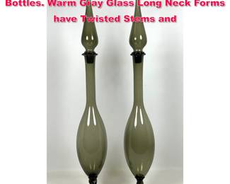 Lot 341 Pr Murano Italy Tall Glass Stoppered Bottles. Warm Gray Glass Long Neck Forms have Twisted Stems and