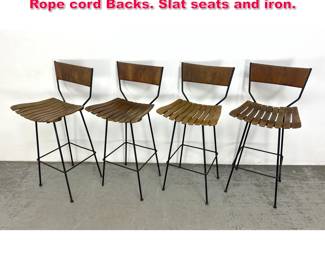 Lot 416 Set 4 Arthur Umanoff Bar stools. Rope cord Backs. Slat seats and iron.