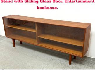 Lot 356 Danish Modern Teak Low Cabinet Stand with Sliding Glass Door. Entertainment bookcase.