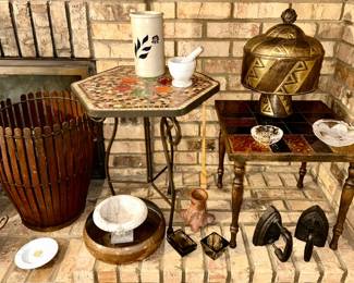 Modern tile mosaic top table w/ metal legs, vintage wooden table with tile top, sad irons (SOLD), smoky quartz ashtrays, heavy clear glass ashtrays, hand hammered covered brass/bronze covered compote, etc.