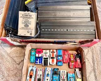 Vintage Aurora Model Motoring slot car set with many slot cars