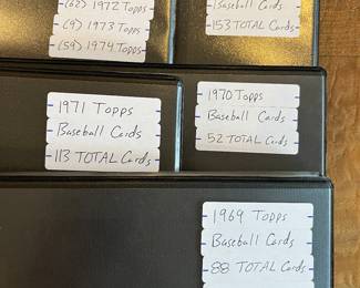 The two 1961 Topps Baseball Cards have SOLD.  The 1969, 1970 & 1972, 1973, 1974 binders with cards are still available.