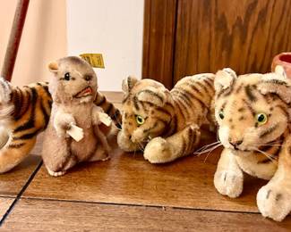 Steiff animals, (2 on left have tags/one has yellow label, 2 on right are jointed)