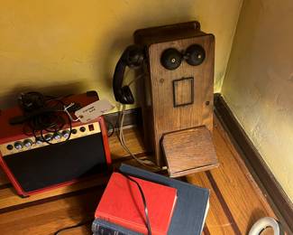 Guitar and vintage telephone