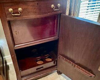 A little cupboard storage below….