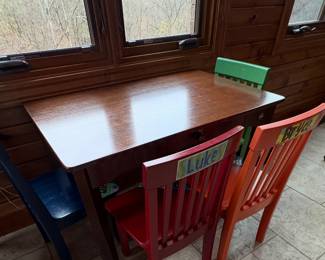 Wooden kids' table and chair set.