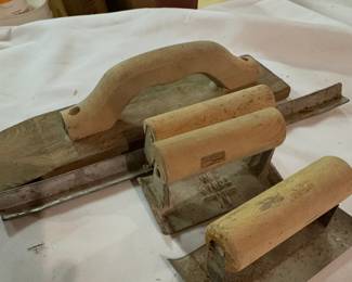 Concrete  finishing tools, specifically hand edgers and groovers