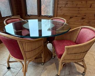 Vintage pencil reed and rattan dining set with a glass top