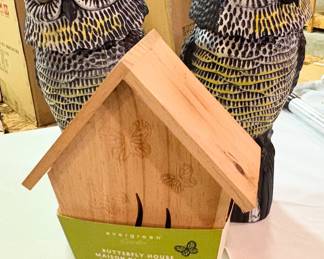Plastic  owl decoy, often used as a bird and pest repellent and butterfly house 