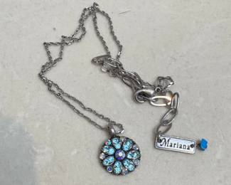 Mariana Guardian Angel pendant necklace with blue and clear Swarovski crystals.