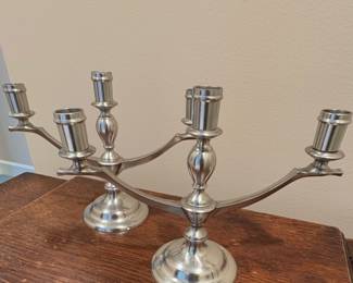 Two three-arm Pewter candelabras.