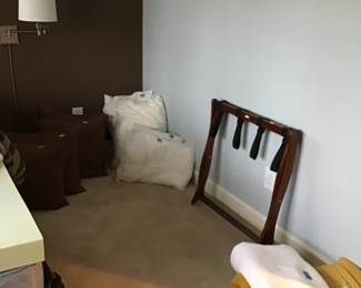 Luggage rack and multiple linens,