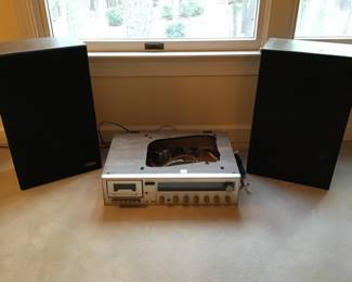 Vintage Fisher stereo/tape deck with speakers.