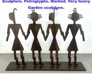 Lot 1139 DOUG WEIGEL Figural Metal Sculpture. Petroglyphs. Marked. Very heavy Garden sculpture. 