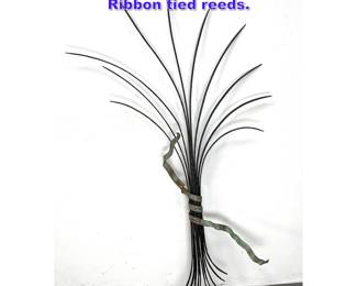 Lot 947 Decorative Iron Wall Sculpture. Ribbon tied reeds. 