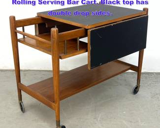 Lot 1088 Mid Century Modern Drop Leaf Rolling Serving Bar Cart. Black top has double drop sides. 