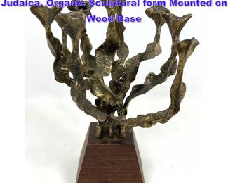 Lot 845 Modernist Brutalist Metal Menorah. Judaica. Organic Sculptural form Mounted on Wood Base