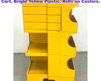 Lot 1048 JOE COLOMBO Bobby Storage Cart. Bright Yellow Plastic. Rolls on Casters.