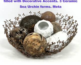 Lot 918 Delicate sculptural lacy metal bowl filled with Decorative Accents. 3 Ceramic Sea Urchin forms. Meta