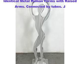 Lot 1259 Modernist Figural Sculpture. Two Identical Metal Human Forms with Raised Arms. Connected by tubes. J