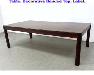 Lot 945 Danish Modern Rosewood Coffee Table. Decorative Banded Top. Label. 