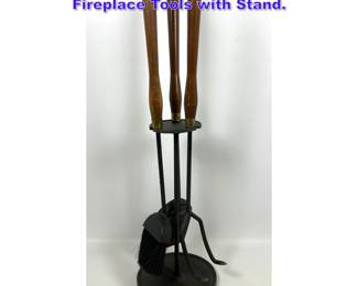 Lot 769 Mid Century Modern Iron and Wood Fireplace Tools with Stand. 