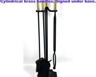 Lot 901 The Adams company fireplace tools. Cylindrical brass handles. Signed under base. 