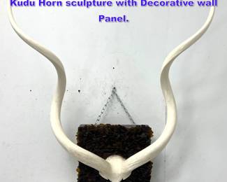 Lot 948 Large Decorator Wall Mount Faux Kudu Horn sculpture with Decorative wall Panel. 