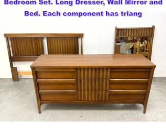 Lot 1195 3pc American Modern Walnut Bedroom Set. Long Dresser, Wall Mirror and Bed. Each component has triang