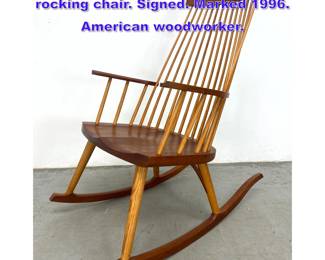 Lot 762 Thomas Moser Cabinetmakers rocking chair. Signed. Marked 1996. American woodworker. 