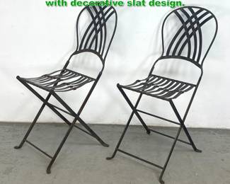 Lot 1485 Pr Iron Folding Chair. Arched Top with decorative slat design. 