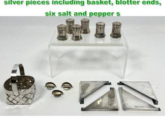 Lot 1689 Silver Group of Cartier sterling silver pieces including basket, blotter ends, six salt and pepper s