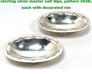 Lot 1697 Pair of antique Georg Jensen sterling silver master salt dips, pattern 243D, each with decorated rim