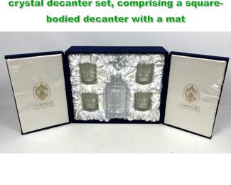 Lot 1887 Faberge Metropolitan fivepiece crystal decanter set, comprising a squarebodied decanter with a mat