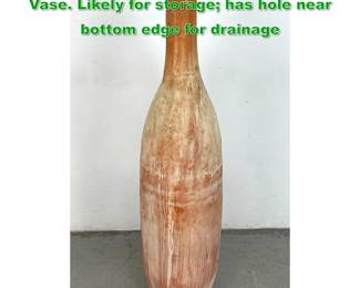 Lot 1553 Dramatic 7 Tall Terracotta Bottle Vase. Likely for storage has hole near bottom edge for drainage