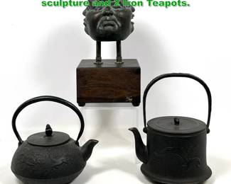 Lot 1763 3pc Japanese Metal Lot. Face sculpture and 2 Iron Teapots. 