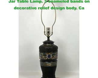 Lot 1773 Metal Champleve Enamel Covered Jar Table Lamp. 3 enameled bands on decorative relief design body. Ca