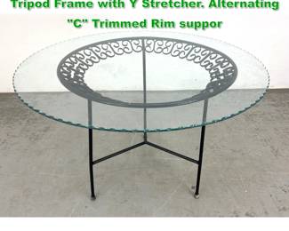 Lot 1527 Arthur Umanoff round dining table. Tripod Frame with Y Stretcher. Alternating C Trimmed Rim suppor