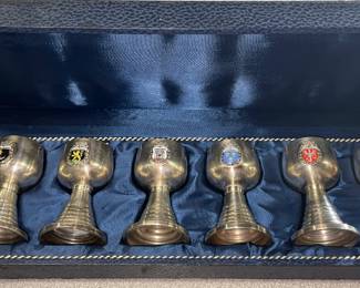 Six German shot glasses made of metal